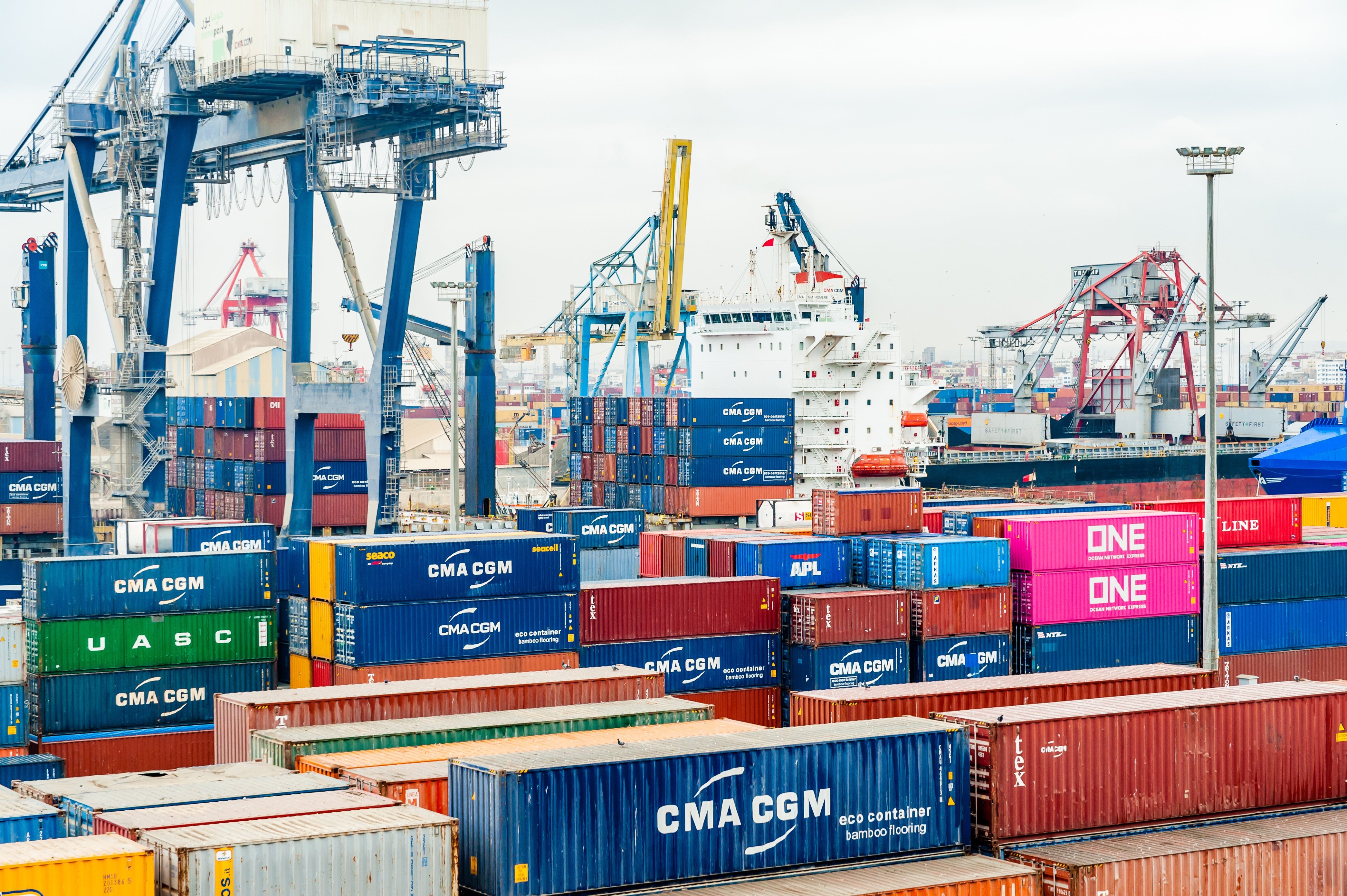 Global trade operations with containers and logistics